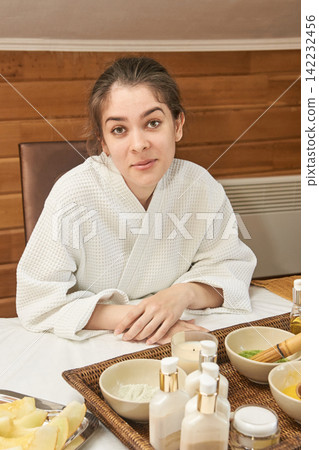 Young Caucasian Female In Spa Setting With Relaxation Rituals And Skincare Products For Wellness Young Caucasian Female In Spa Setting With Relaxation Rituals And Skincare Products For Wellness 142232456