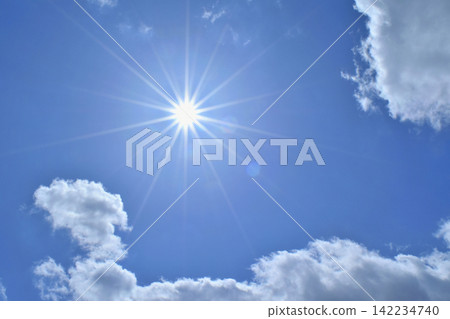 Blue sky and sun, direct sunlight, free space image (fixed shot) Blue sky and sun, direct sunlight, free space image (fixed shot) 142234740