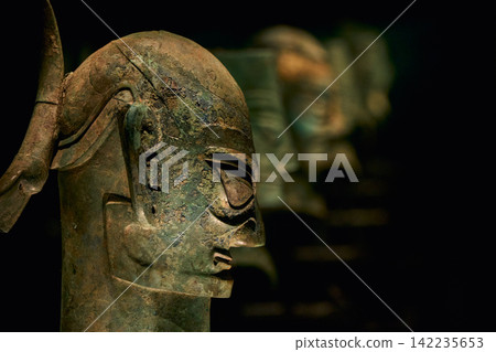 Bronze human face mask on display at Sanxingdui Museum, Guanghan, Sichuan, China Bronze human face mask on display at Sanxingdui Museum, Guanghan, Sichuan, China 142235653