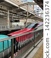 Shinkansen arriving at the station 142236374