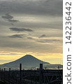 Mount Fuji and railway tracks illuminated by the setting sun 142236442