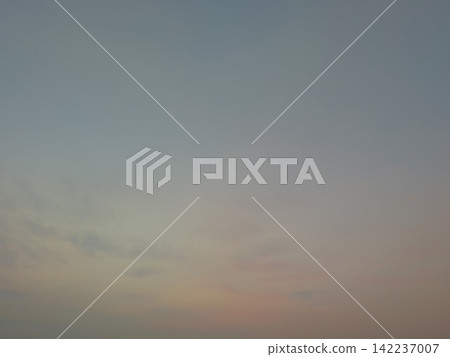 A collection of images featuring either a tranquil sky with soft pink and gray clouds or a dramatic field fire with bright orange flames and thick smoke. A collection of images featuring either a tranquil sky with soft pink and gray clouds or a dramatic field fire with bright orange flames and thick smoke. 142237007