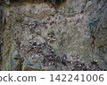 Naturally eroded rock face slope 142241006