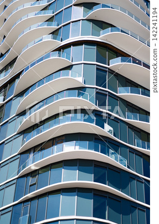 Structural exterior shape. Modern architecture building. Architecture building with detail. Background building structure. Structural building architecture. Architectural exterior detail Structural exterior shape. Modern architecture building. Architecture building with detail. Background building structure. Structural building architecture. Architectural exterior detail 142241194