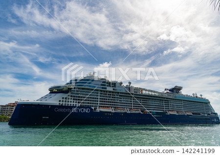 Miami, Florida, USA - July 27, 2025: Cruise in summer vacation. Celebrity Cruises cruise line. Cruise ship tour. Travel by sea. Ship leaving sea port. Celebrity Beyond cruise ship voyage Miami, Florida, USA - July 27, 2025: Cruise in summer vacation. Celebrity Cruises cruise line. Cruise ship tour. Travel by sea. Ship leaving sea port. Celebrity Beyond cruise ship voyage 142241199