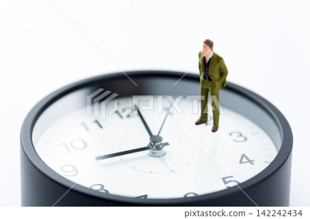 Businessman and watch Businessman and watch 142242434