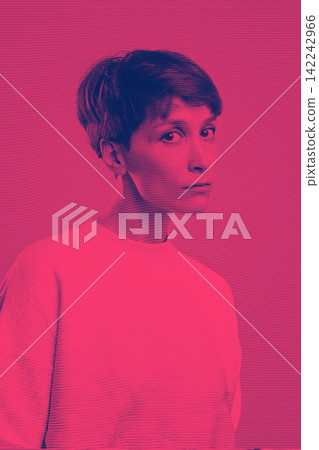 The portrait of a young woman with big sad eyes looking at camera at studio. woman teenager concept. Young caucasian model. Female face close up. Emotions concept. Trendy short stylish haircut The portrait of a young woman with big sad eyes looking at camera at studio. woman teenager concept. Young caucasian model. Female face close up. Emotions concept. Trendy short stylish haircut 142242966
