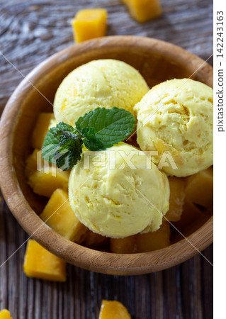 Homemade mango ice cream. Homemade mango ice cream. 142243163