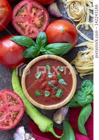 Homemade tomato sauce with basil. 142243166
