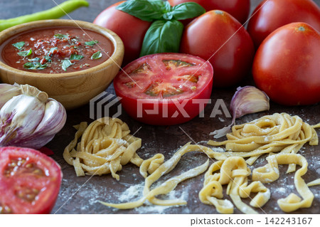 Italian homemade pasta and tomato sauce. Italian homemade pasta and tomato sauce. 142243167