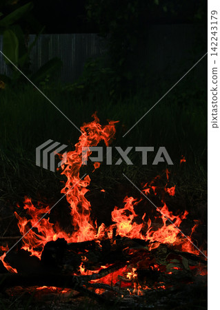 Vibrant Red and Orange Fire Flames Blaze Isolated on Black Background Vibrant Red and Orange Fire Flames Blaze Isolated on Black Background 142243179