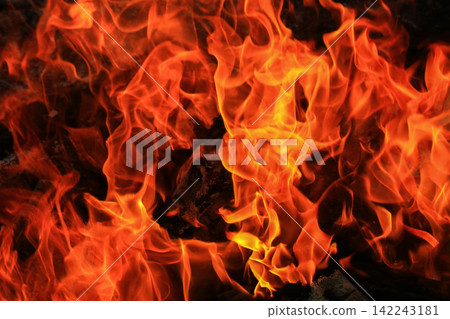 Vibrant Red and Orange Fire Flames Blaze Isolated on Black Background Vibrant Red and Orange Fire Flames Blaze Isolated on Black Background 142243181