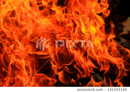 Vibrant Red and Orange Fire Flames Blaze Isolated on Black Background Vibrant Red and Orange Fire Flames Blaze Isolated on Black Background 142243186
