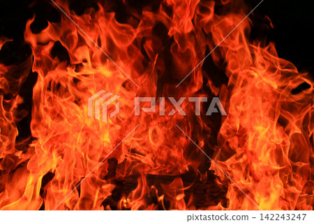 Vibrant Red and Orange Fire Flames Blaze Isolated on Black Background Vibrant Red and Orange Fire Flames Blaze Isolated on Black Background 142243247