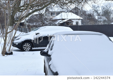 Cars in the snow. Cars in the snow. 142244374
