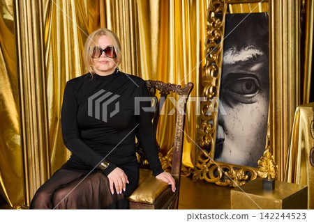 Modern art scene featuring fashionable woman and rich decor Modern art scene featuring fashionable woman and rich decor 142244523