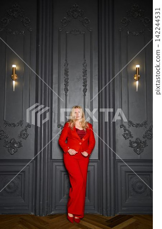 Artistic female director showcasing stylish pose with backdrop Artistic female director showcasing stylish pose with backdrop 142244531