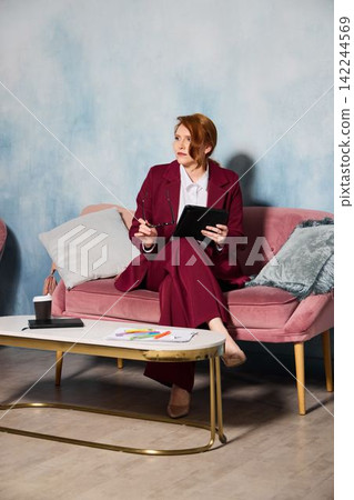 Remote consultant interacts with client over digital presentation 142244569
