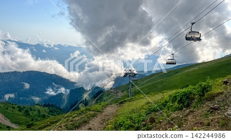 Chairlift Over the Green Slopes of Rosa Khutor Chairlift Over the Green Slopes of Rosa Khutor 142244986