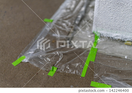 Exterior wall painting work: protective covering and plastic protective sheeting Exterior wall painting work: protective covering and plastic protective sheeting 142246400