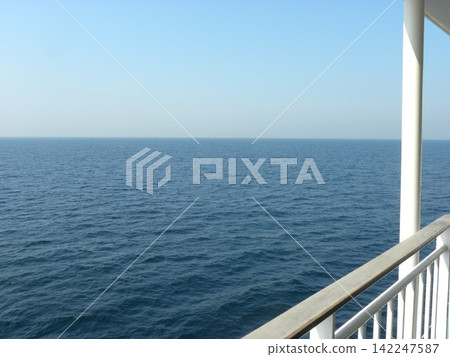 Looking out at the blue sea from the ferry Looking out at the blue sea from the ferry 142247587