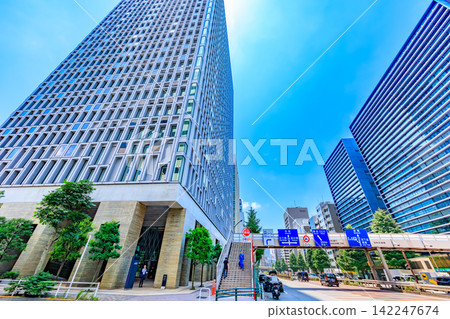 Urban landscape along Showa-dori Avenue in Chuo Ward, Tokyo, near Kyobashi 2-chome. 142247674