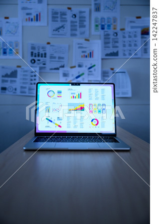 Graphs and analysis data displayed on the laptop screen Graphs and analysis data displayed on the laptop screen 142247837