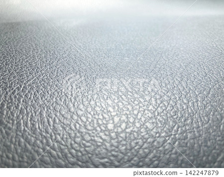 Leather product and car interior texture, gray leather-like, synthetic leather surface texture background, grained finish Leather product and car interior texture, gray leather-like, synthetic leather surface texture background, grained finish 142247879