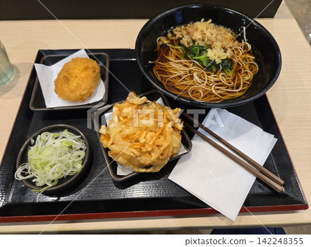Hot soba noodles with tempura and croquettes Hot soba noodles with tempura and croquettes 142248355