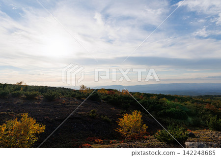 A view from Tokachi Bogakudai towards Shirogane Blue Pond in the evening (Autumn in Hokkaido) A view from Tokachi Bogakudai towards Shirogane Blue Pond in the evening (Autumn in Hokkaido) 142248685