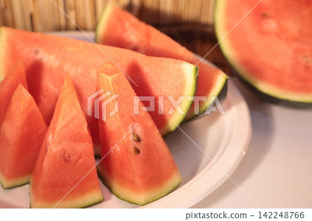 Cut red watermelon Cut red watermelon 142248766