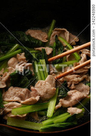 Pork and komatsuna being slaughtered Pork and komatsuna being slaughtered 142248980