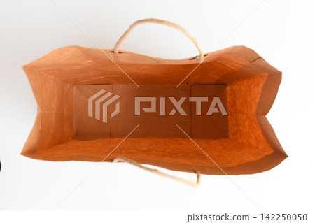 brown paper bag isolated on white background, recycle material brown paper bag isolated on white background, recycle material 142250050