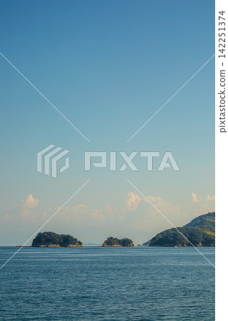 Blue skies and the tranquil islands of the Seto Inland Sea Blue skies and the tranquil islands of the Seto Inland Sea 142251374
