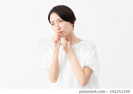 A woman wearing a white blouse - Lifestyle image A woman wearing a white blouse - Lifestyle image 142252199