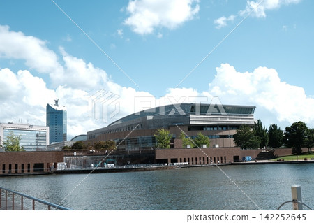 Modern architecture along the river: Brick modern building Modern architecture along the river: Brick modern building 142252645