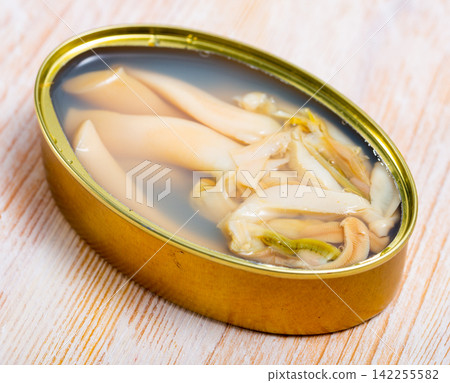 Image of tasty sea natural navajas in open tin can at table Image of tasty sea natural navajas in open tin can at table 142255582