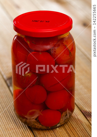 Tomatoes marinated in jars Tomatoes marinated in jars 142255665