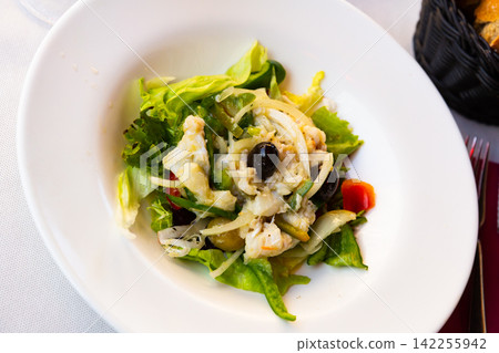 Esqueixada of marinated cod with vegetables Esqueixada of marinated cod with vegetables 142255942
