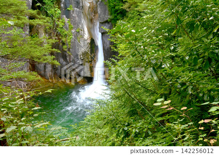 Ushigataki Falls, a magnificent waterfall cascading down the Kakisore Valley. Ushigataki Falls, a magnificent waterfall cascading down the Kakisore Valley. 142256012