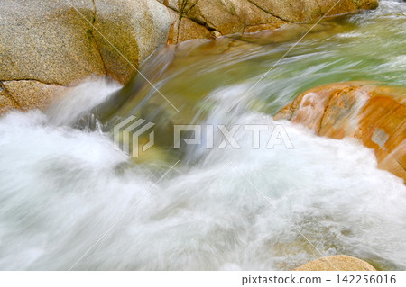 Kakisore Valley: A beautiful stream flowing between rocks. Kakisore Valley: A beautiful stream flowing between rocks. 142256016