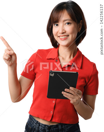 Happy asian woman pointing finger up holding digital tablet wearing casual red shirt presenting idea with cheerful smile transparency Happy asian woman pointing finger up holding digital tablet wearing casual red shirt presenting idea with cheerful smile transparency 142256137