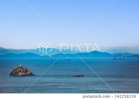 Bungo Channel Mizunoko Lighthouse and the mountain ranges of the Shikoku region Bungo Channel Mizunoko Lighthouse and the mountain ranges of the Shikoku region 142258139