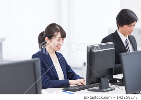 People working in the office People working in the office 142259175