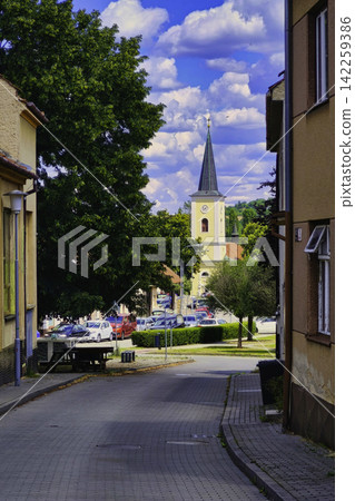 Panoramic view of Brno-Bystrc district with Church of Saint John the Baptist and surrounding green hills, Czech Republic. Panoramic view of Brno-Bystrc district with Church of Saint John the Baptist and surrounding green hills, Czech Republic. 142259386