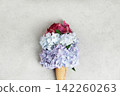 Multicolor Hydrangeas in Ice Cream Cone on Neutral Background 142260263
