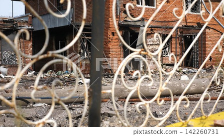 View to destroyed residential buildings at Kharkivska oblast. Ruined houses after bomb attacks on ukrainian territory from russia army. Consequences of russian invasion of Ukraine. Slow motion 142260731