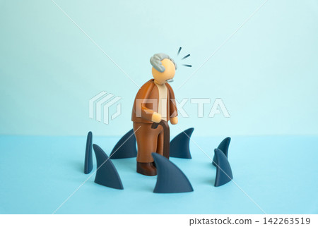 An elderly man surrounded by a circle of shark fins. Loneliness and vulnerability. Symbol of life challenges, crisis and the relentless passage of time. Aging brings uncertainty and risk. An elderly man surrounded by a circle of shark fins. Loneliness and vulnerability. Symbol of life challenges, crisis and the relentless passage of time. Aging brings uncertainty and risk. 142263519