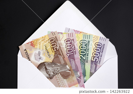 Angolan Kwanza in a white envelope Angolan Kwanza in a white envelope 142263922