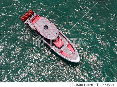 Luxury boat yachting. Motorboat sailing at sea. Luxury private yacht in sea. Motor yacht luxury vessel. Boat motor aerial. Vacation trip on summer. Aerial view motorboat. Yacht boat tour Luxury boat yachting. Motorboat sailing at sea. Luxury private yacht in sea. Motor yacht luxury vessel. Boat motor aerial. Vacation trip on summer. Aerial view motorboat. Yacht boat tour 142263943